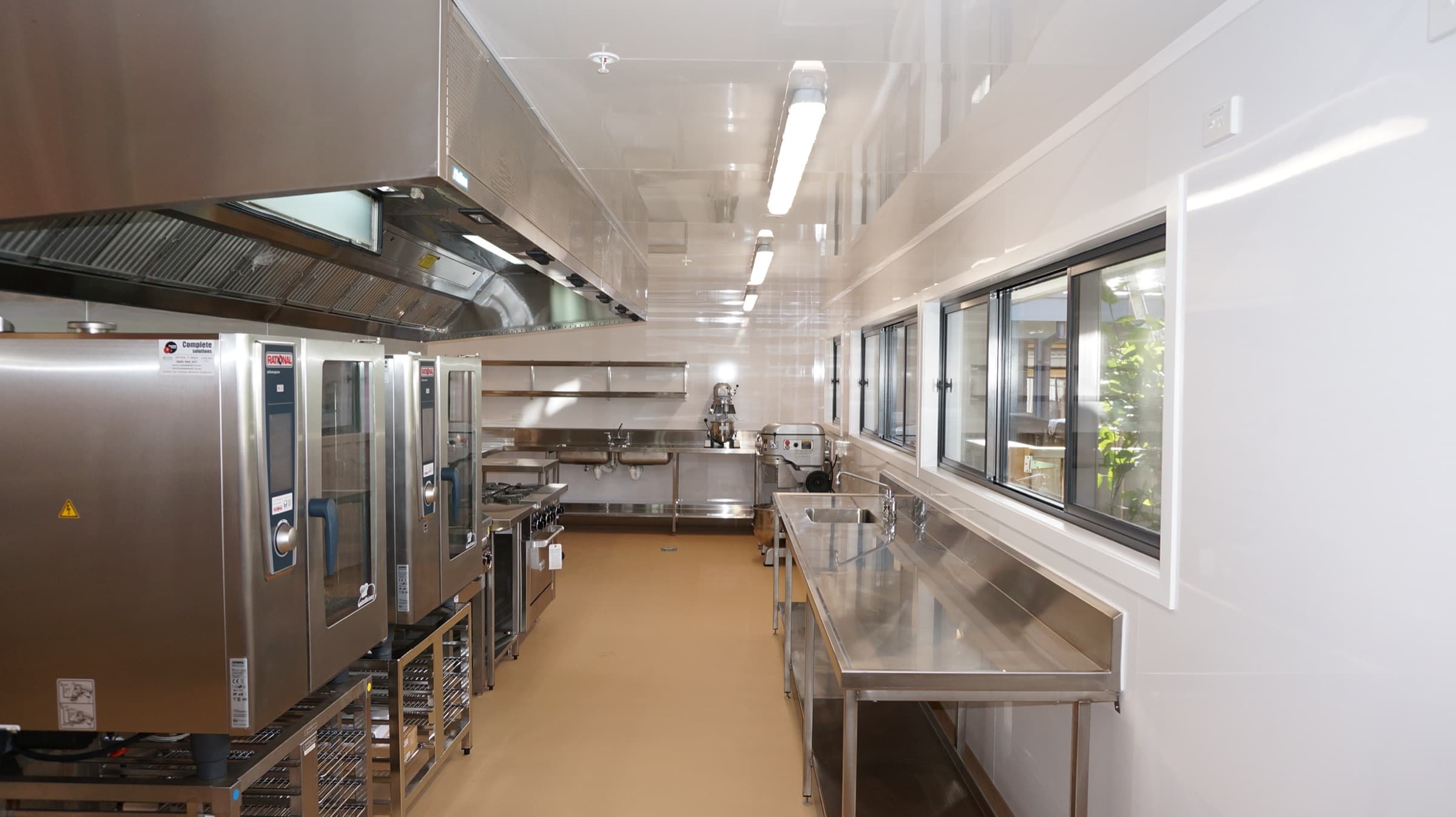 Commercial kitchen fit-out lined with Hydrapanel walls and ceiling